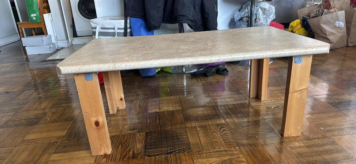 Custom coffee table with stone-look top