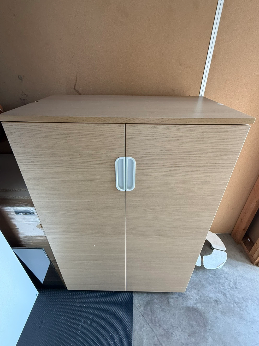 Light Oak Finish 2-Door Storage Cabinet  – $150