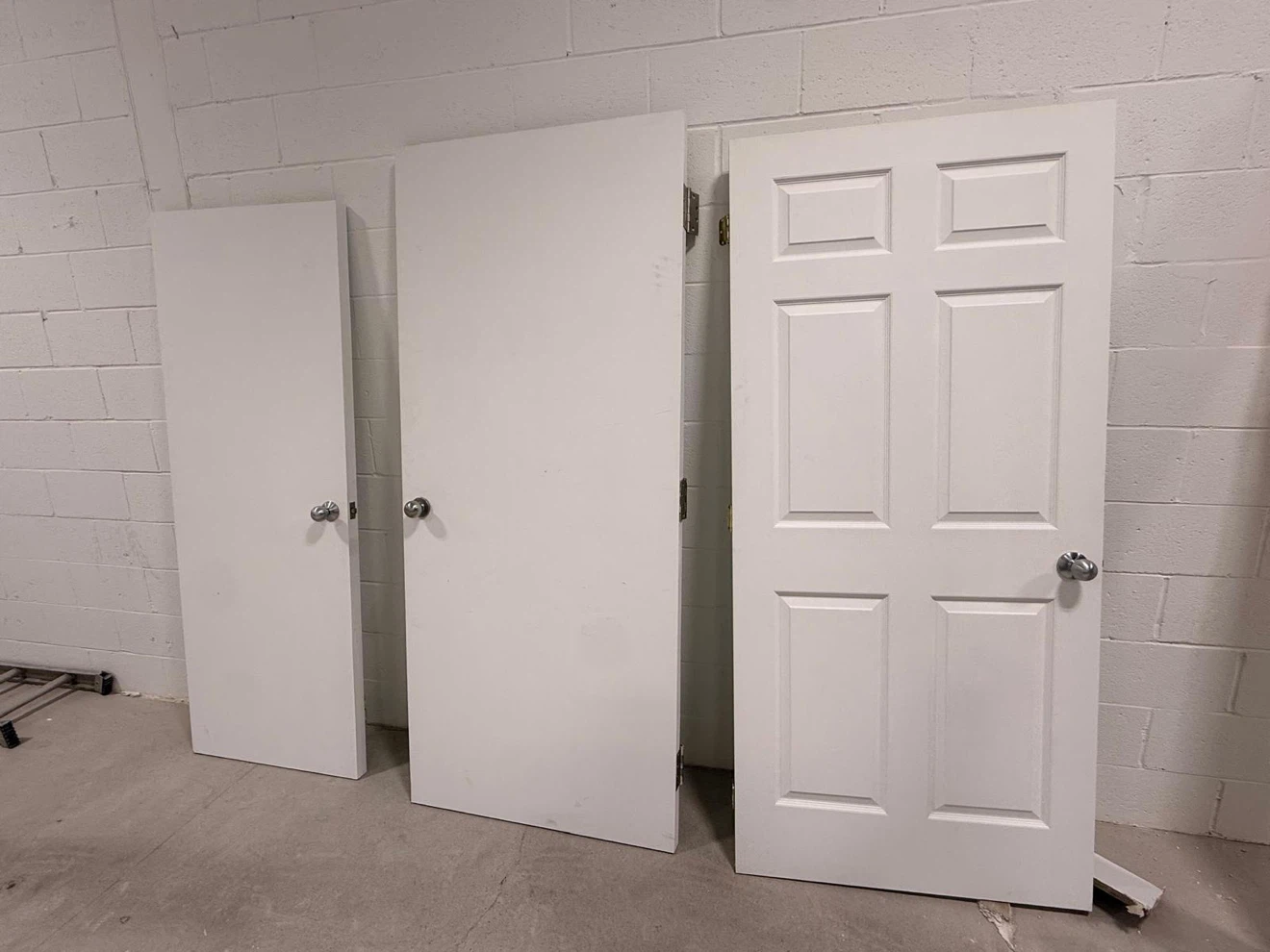 Three White Interior Doors