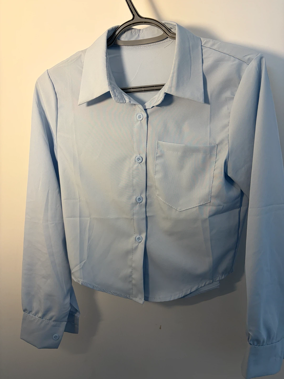 Light blue button-up shirt