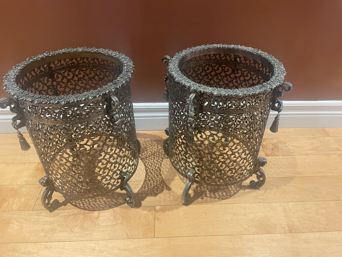 Pair of ornate metal waste baskets