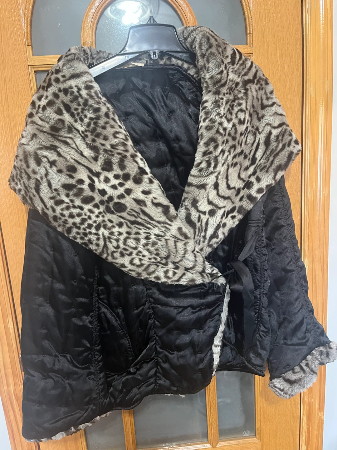 Black Quilted Jacket with Leopard Faux Fur Collar
