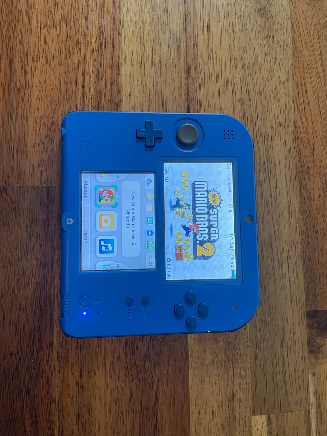 Used electric blue 2ds handheld console