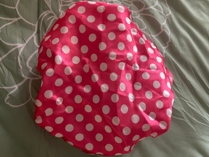 Pink and white polka dot shower cap
