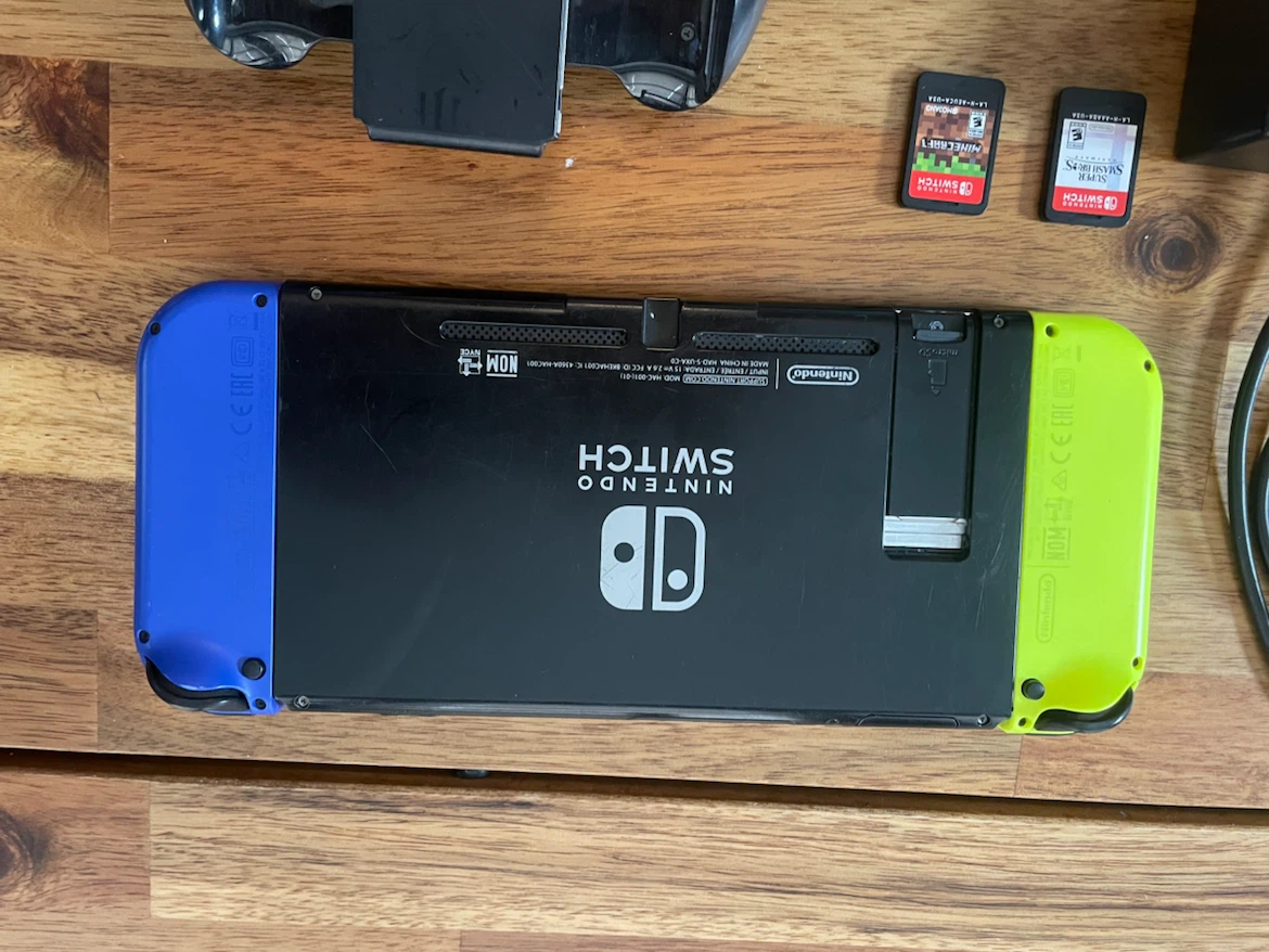 Used Nintendo switch console and games - photo 3
