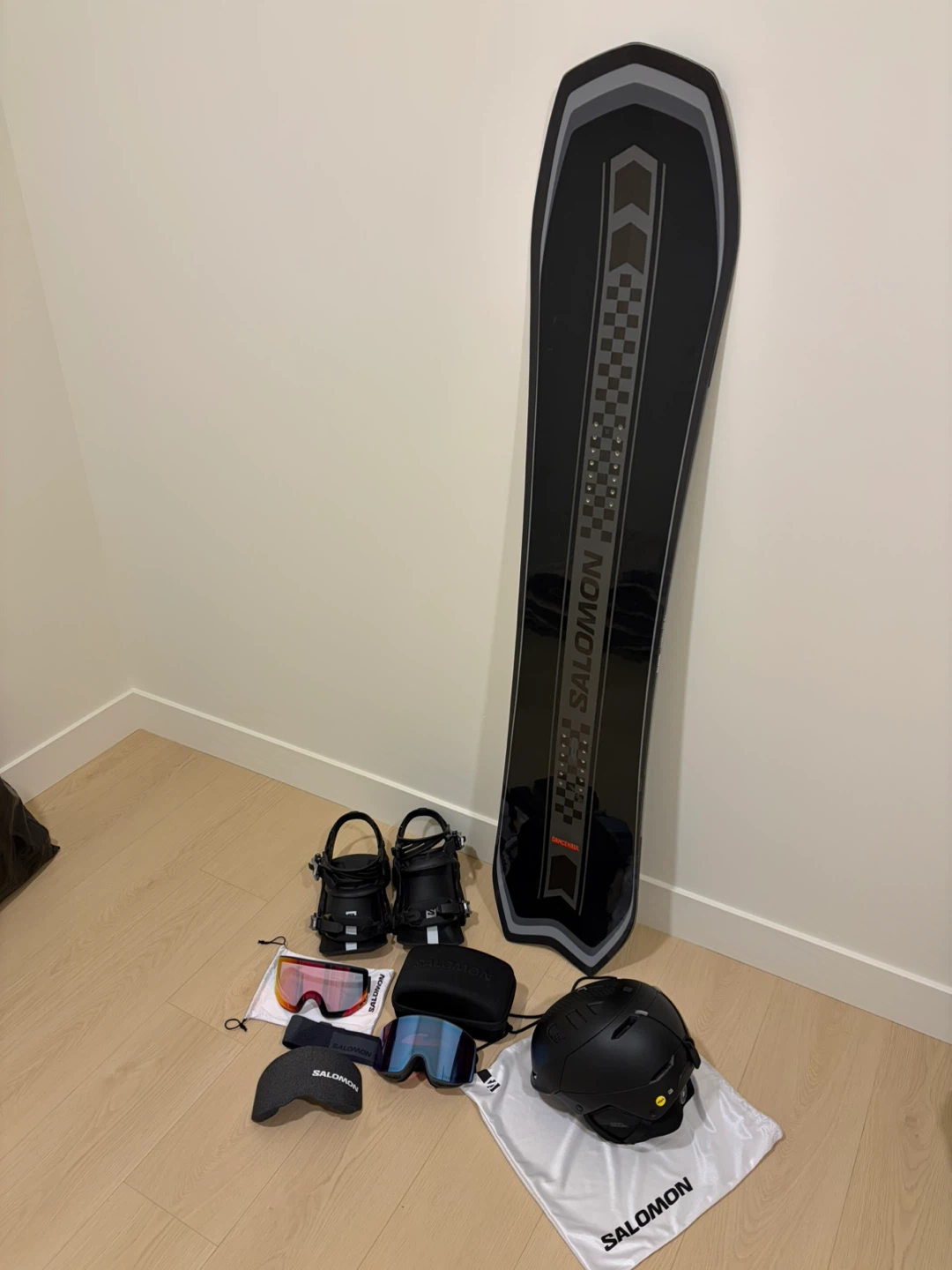 Salomon Snowboard Set with Bindings, Helmet, and Goggles