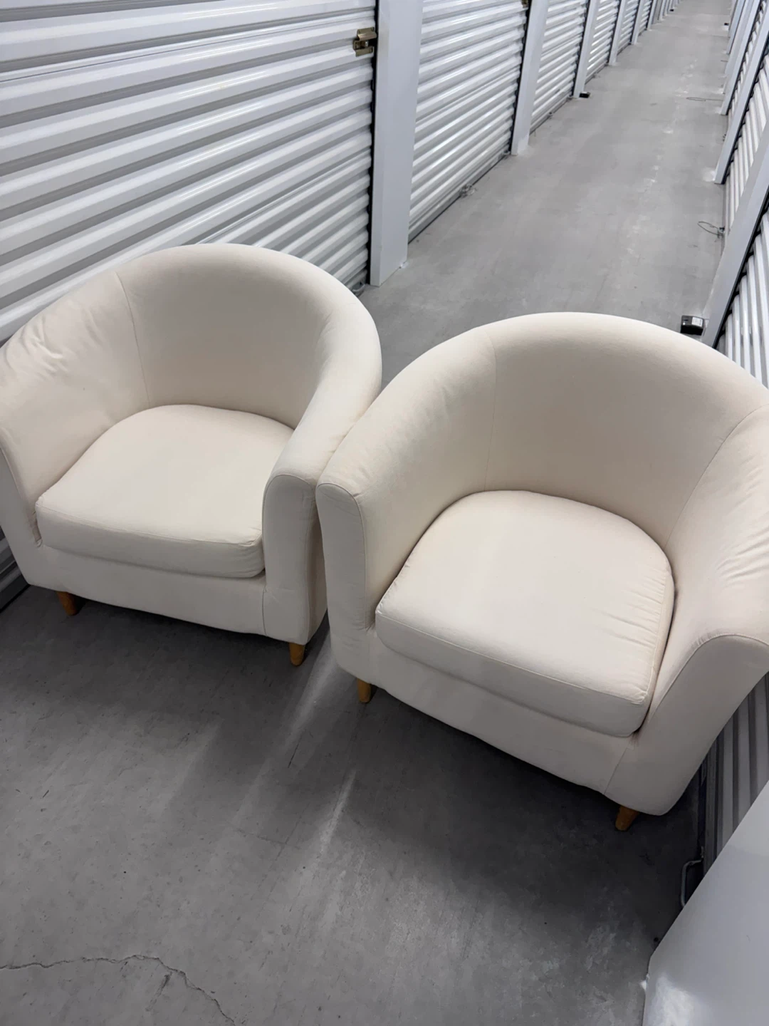 Two Cream Accent Tubes Chairs