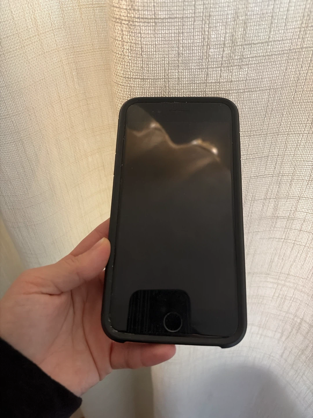 Black iPhone 8 w/ Case