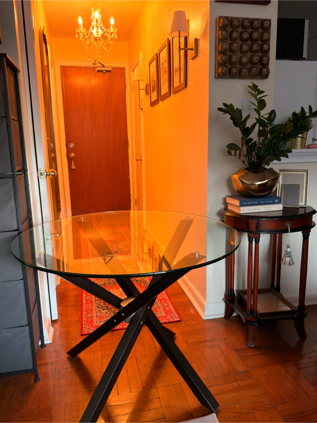 Round Glass Dining Table with dark brown wooden Base