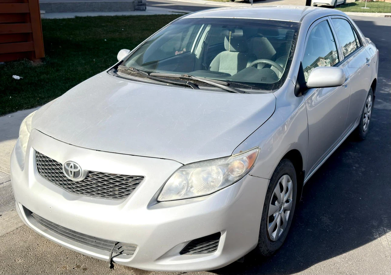 Silver Toyota Corolla CE 2009