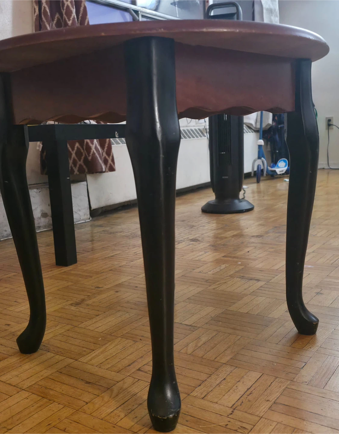 Round wooden side table