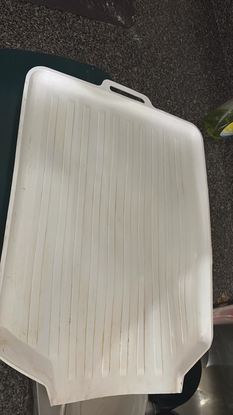 White Plastic under Untensils basket