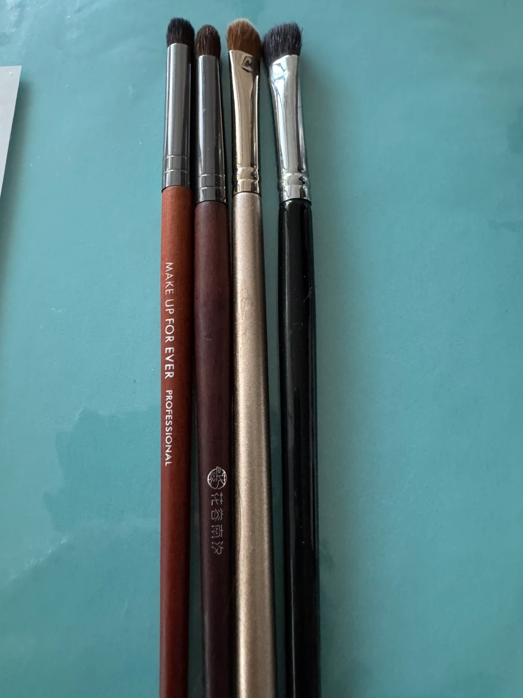 4 Assorted Makeup forever Brushes