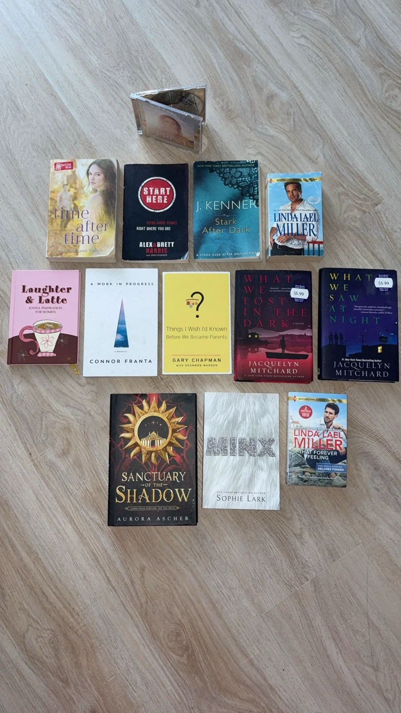 Assorted Paperback Books and Katy Perry CD
