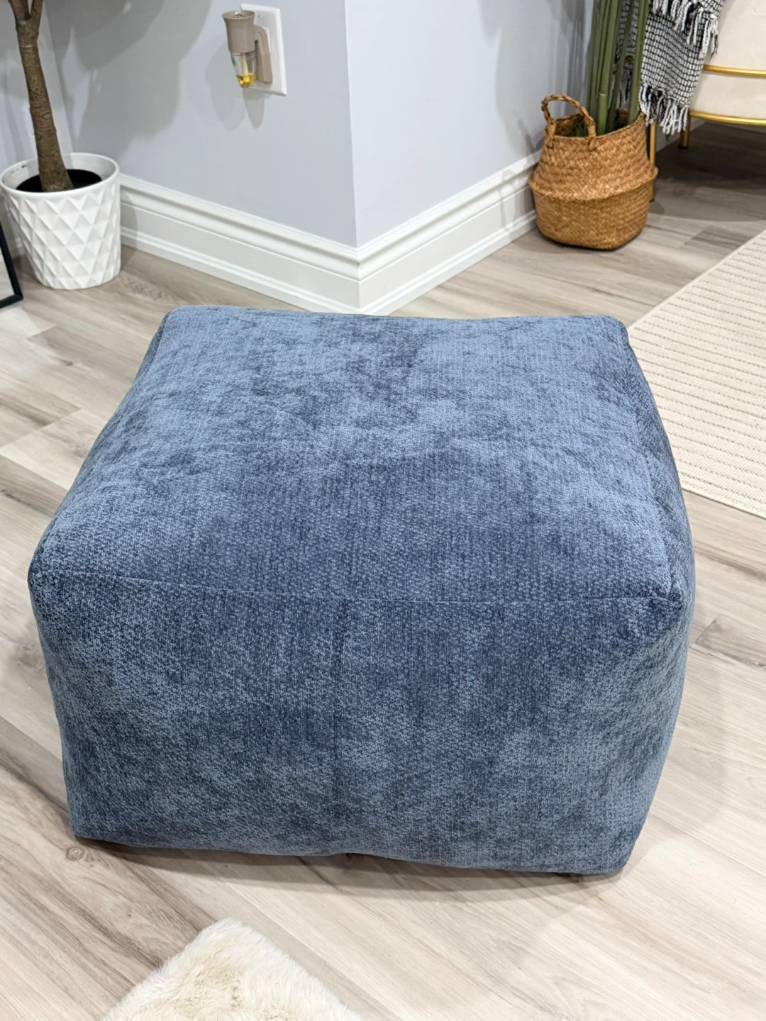 Blue fabric ottoman