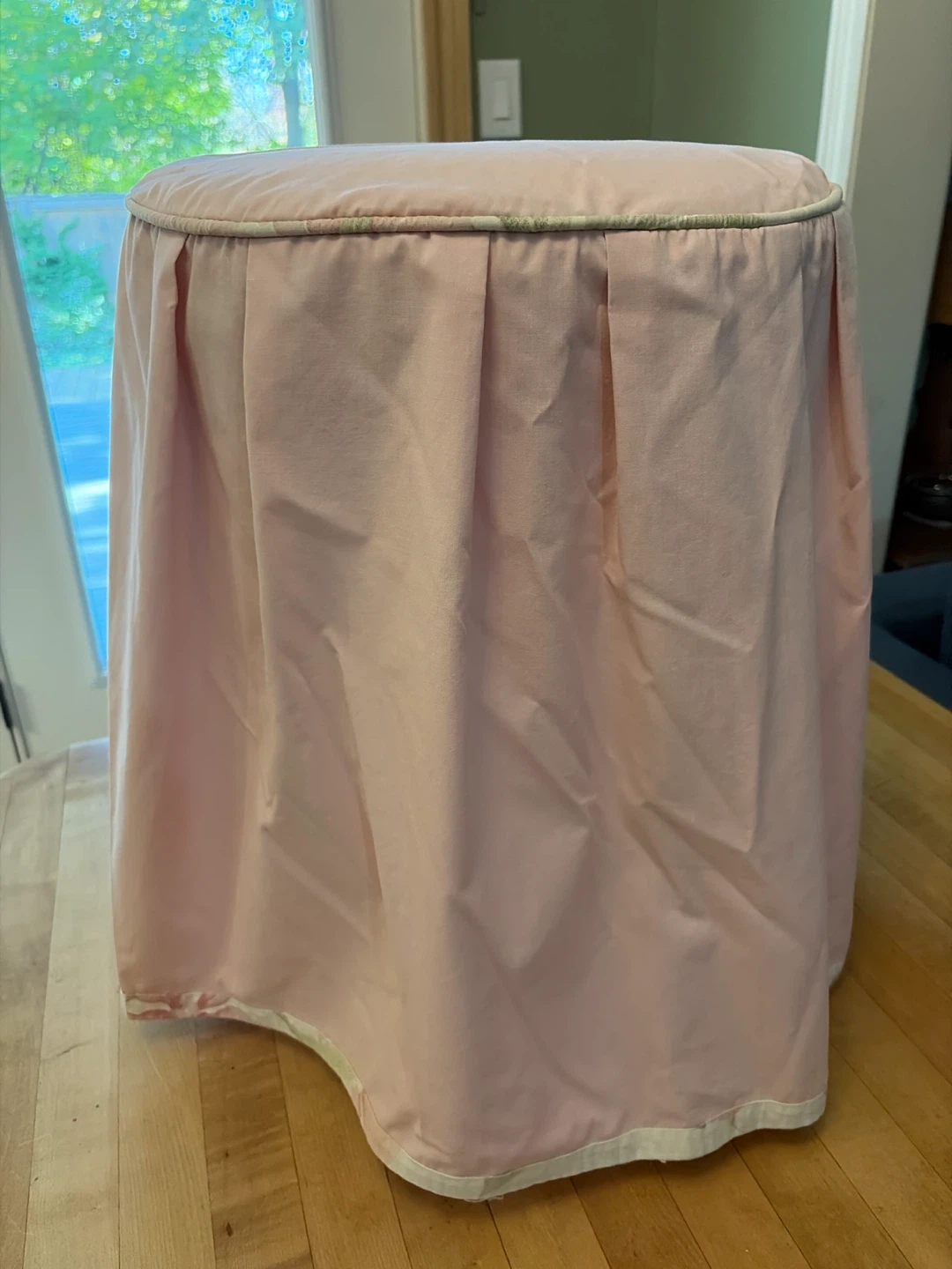 Pink fabric vanity stool and cover