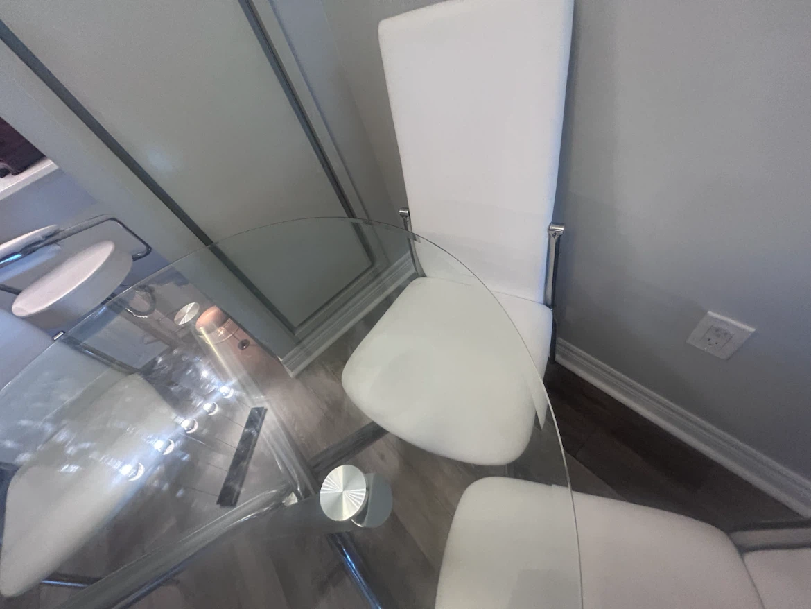 White faux leather dining chairs