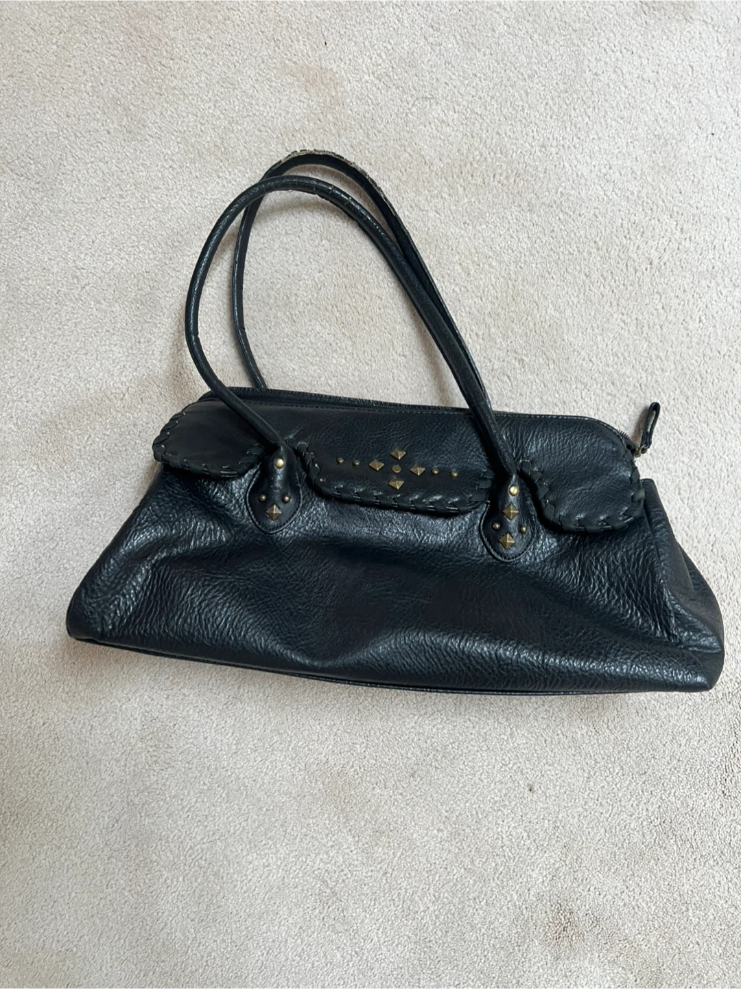 Black shoulder bag with stud details