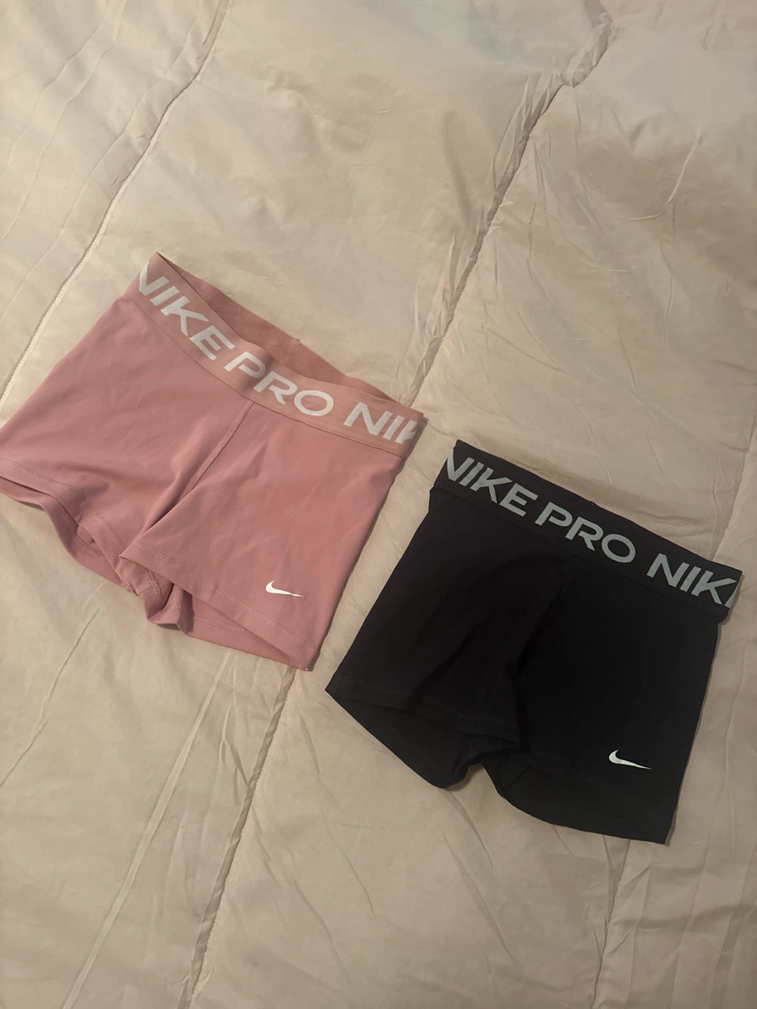 Two pairs of Nike Pro shorts