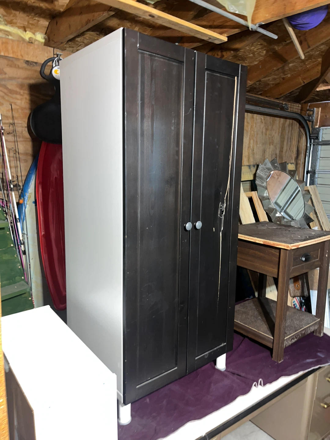 Black and white two-door wardrobe