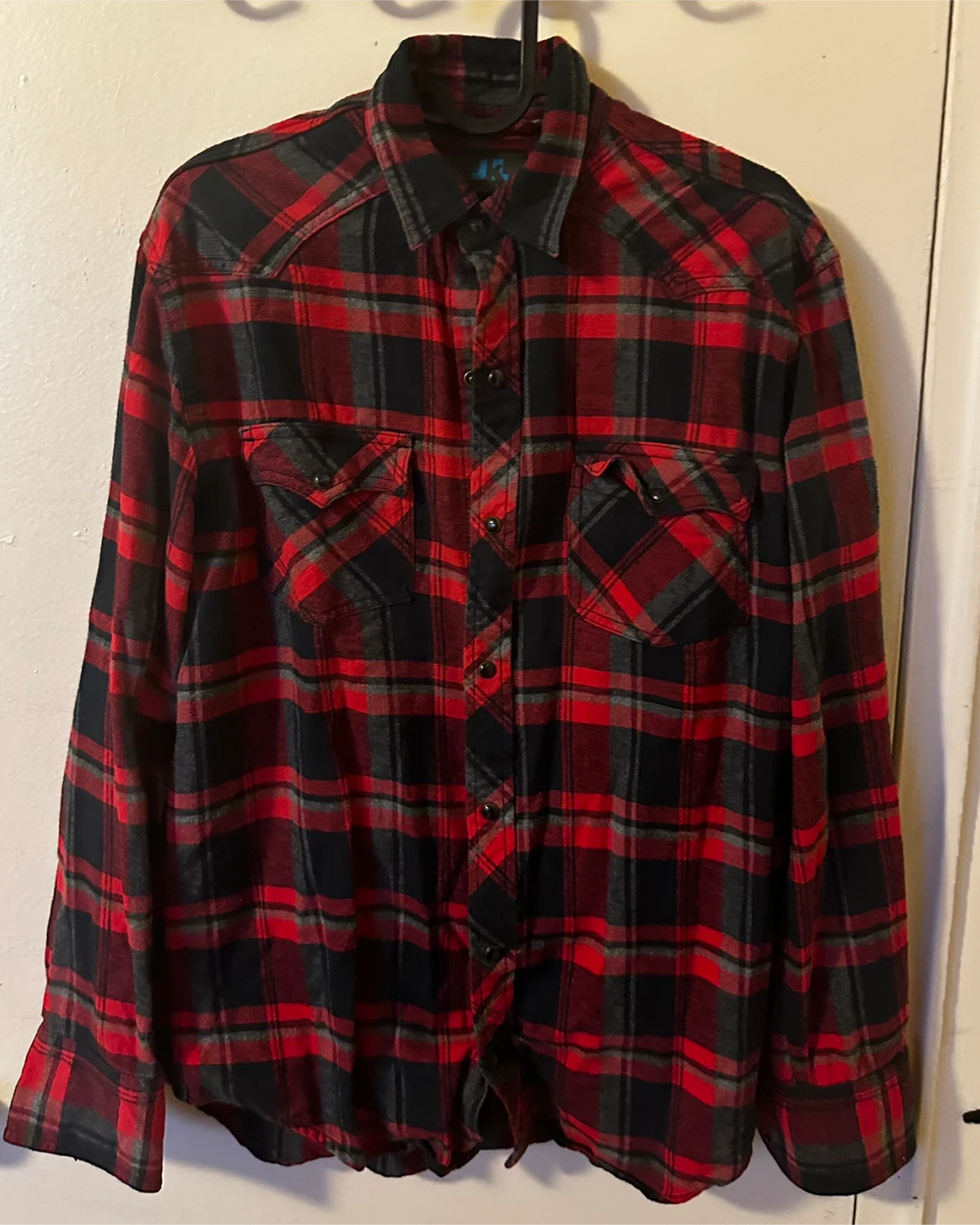 Red and black plaid button-up shirt