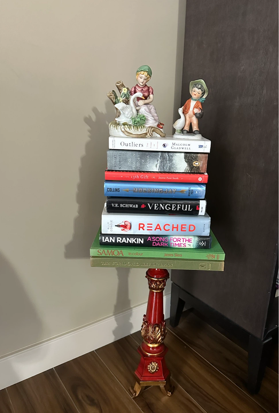 Red Accent Pillar, Vintage Figurines & Book Stack - photo 2