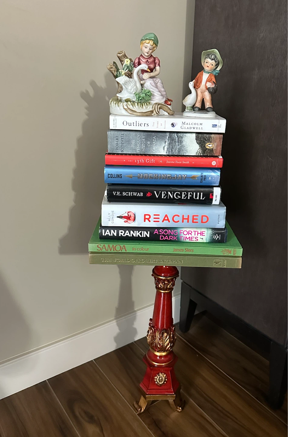 Red Accent Pillar, Vintage Figurines & Book Stack - photo 3