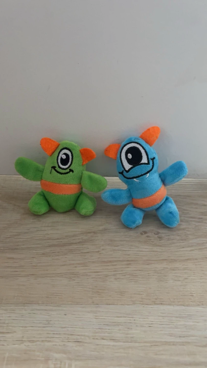 Two plush monster toys