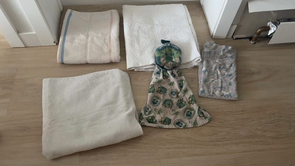 Assorted Kitchen Towels and Hanging Towel