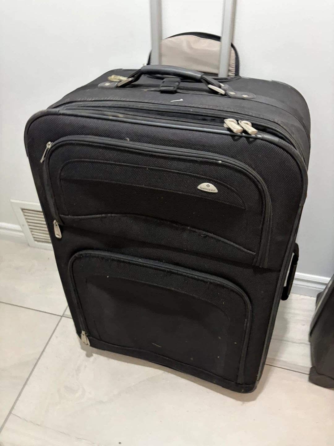 Samsonite Black Rolling Suitcase -expandable