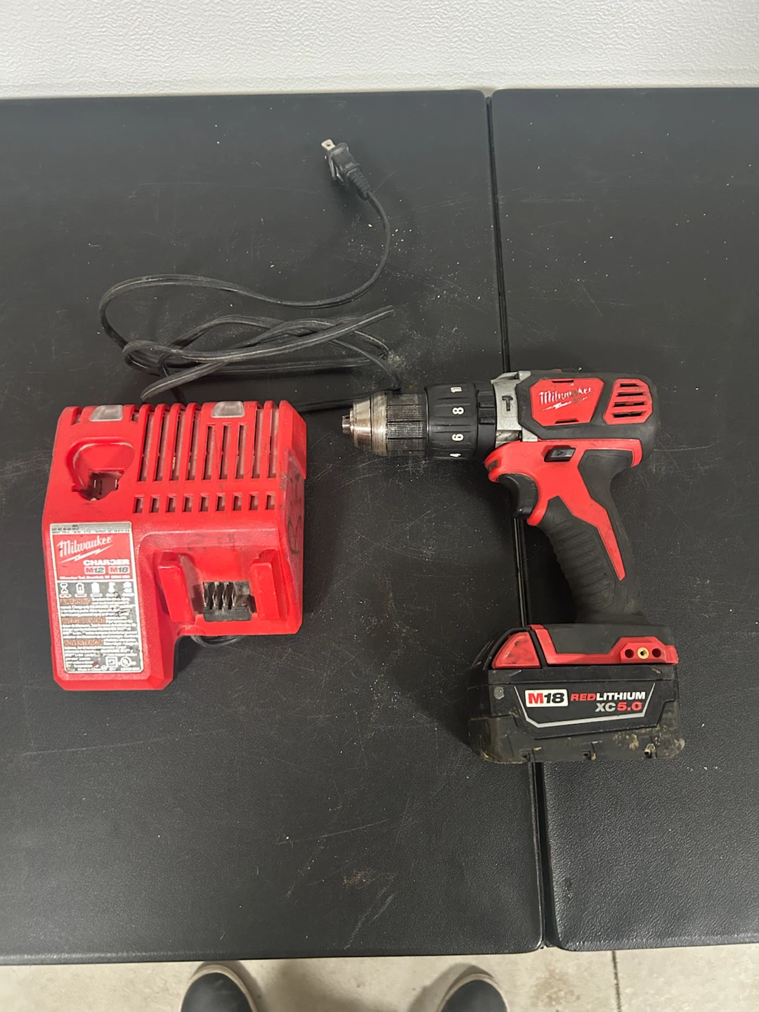 Milwaukee M18 Hammer Drill with M18/M12 Charger XC5.0 Battery