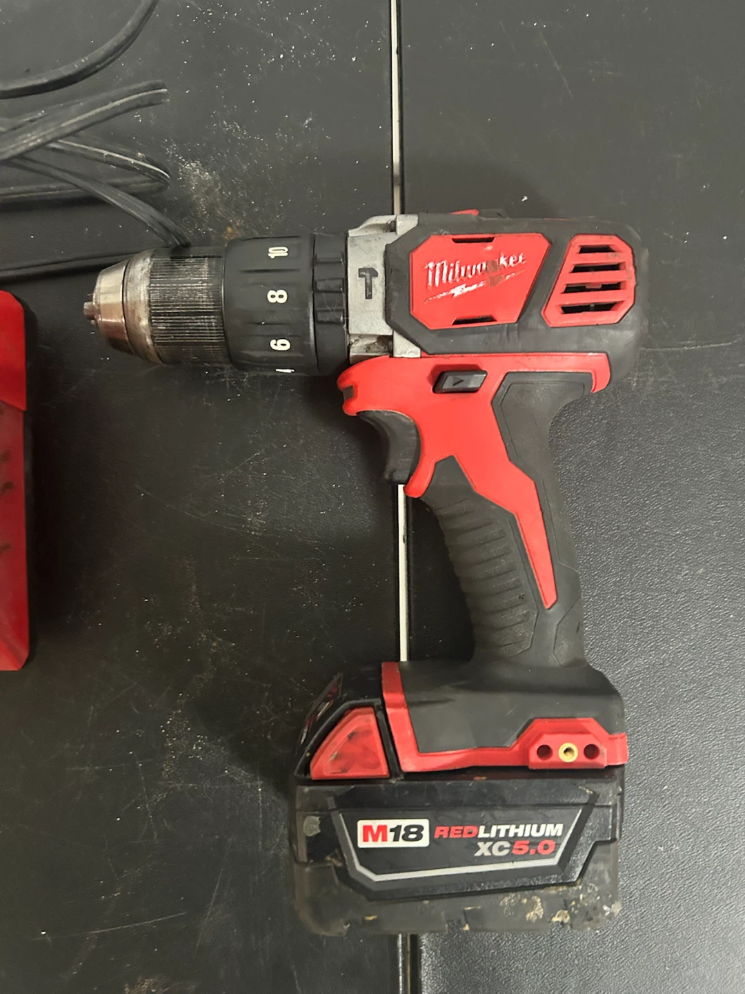 Milwaukee M18 Hammer Drill with M18/M12 Charger XC5.0 Battery - photo 2