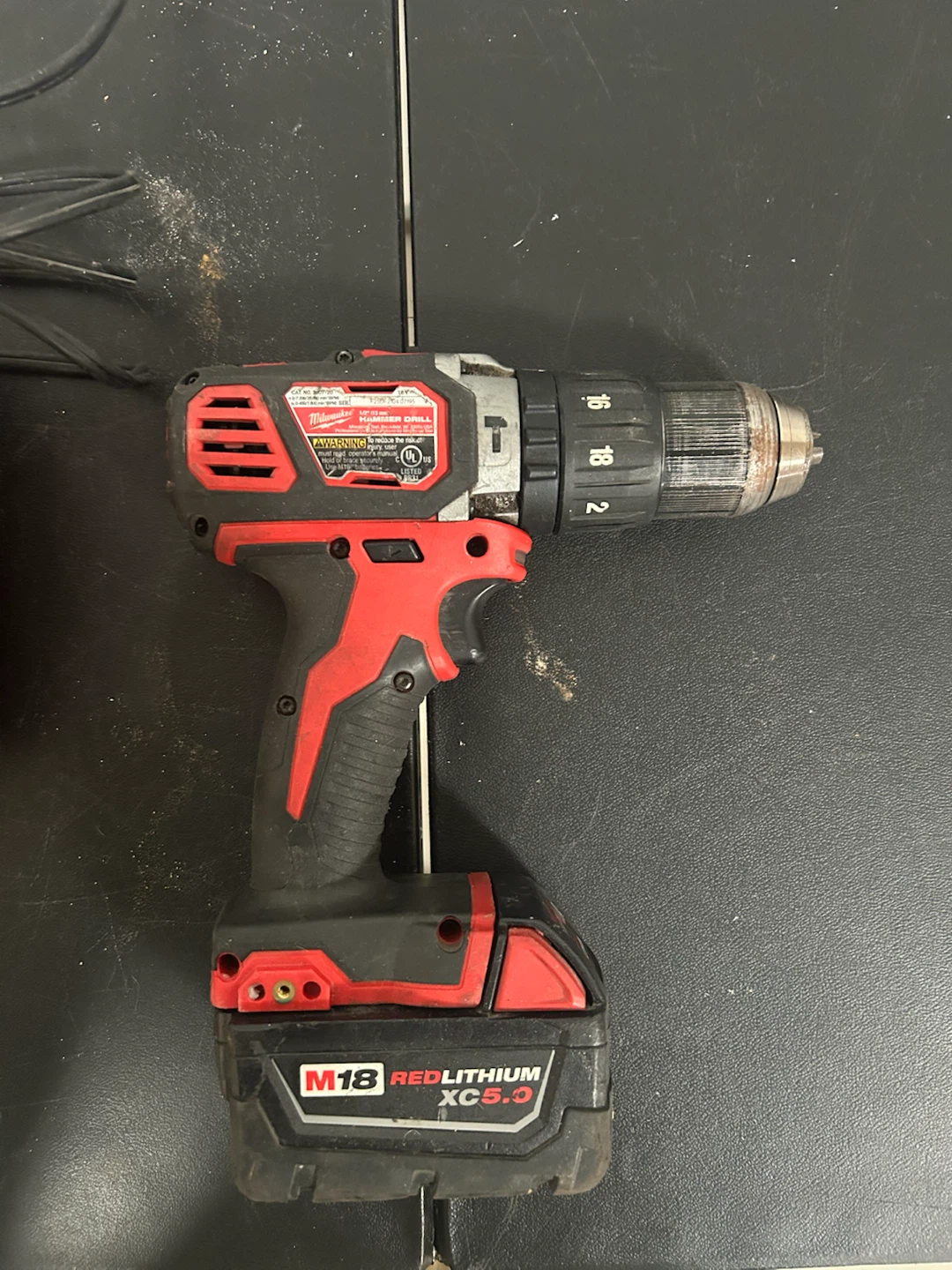 Milwaukee M18 Hammer Drill with M18/M12 Charger XC5.0 Battery - photo 3