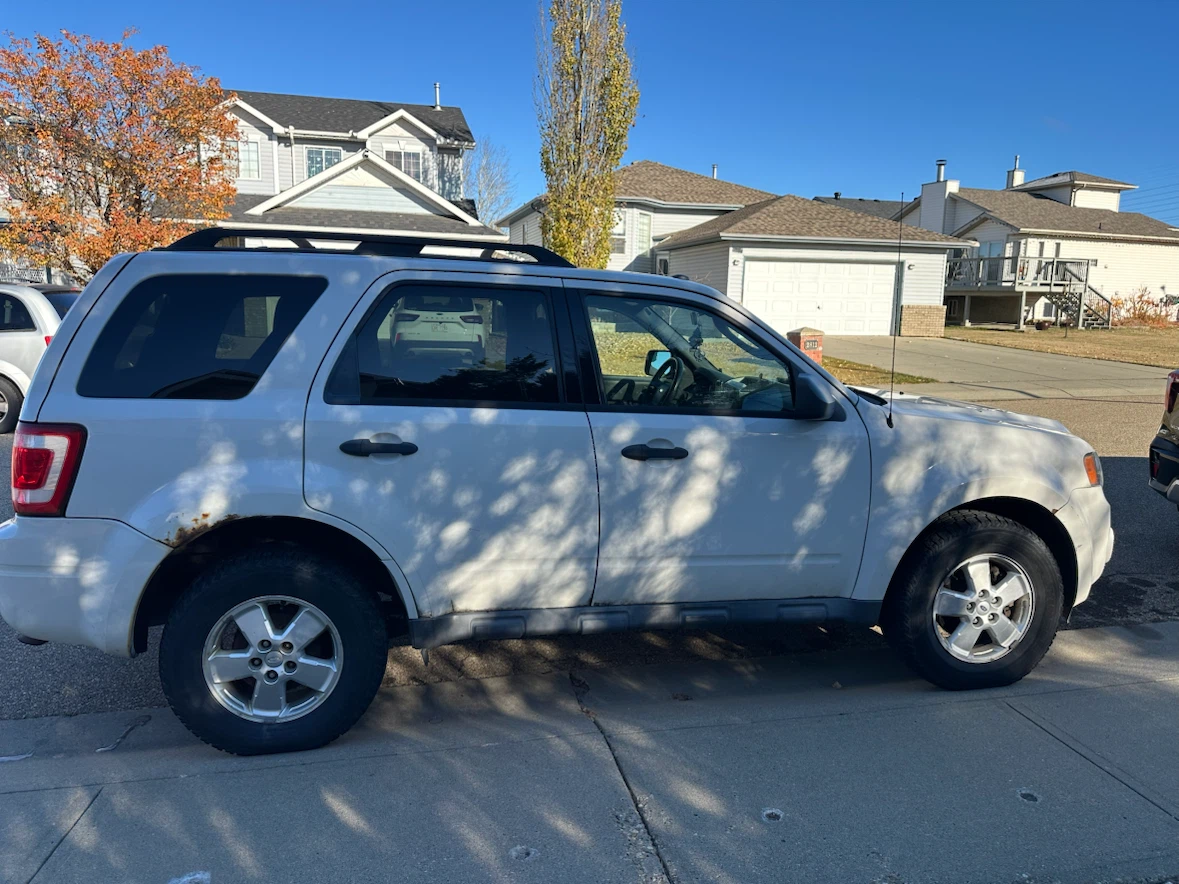 White Ford Escape SUV
