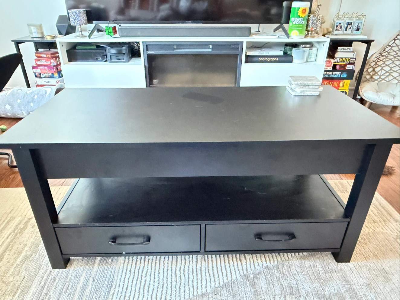 Black lift-top coffee table with storage