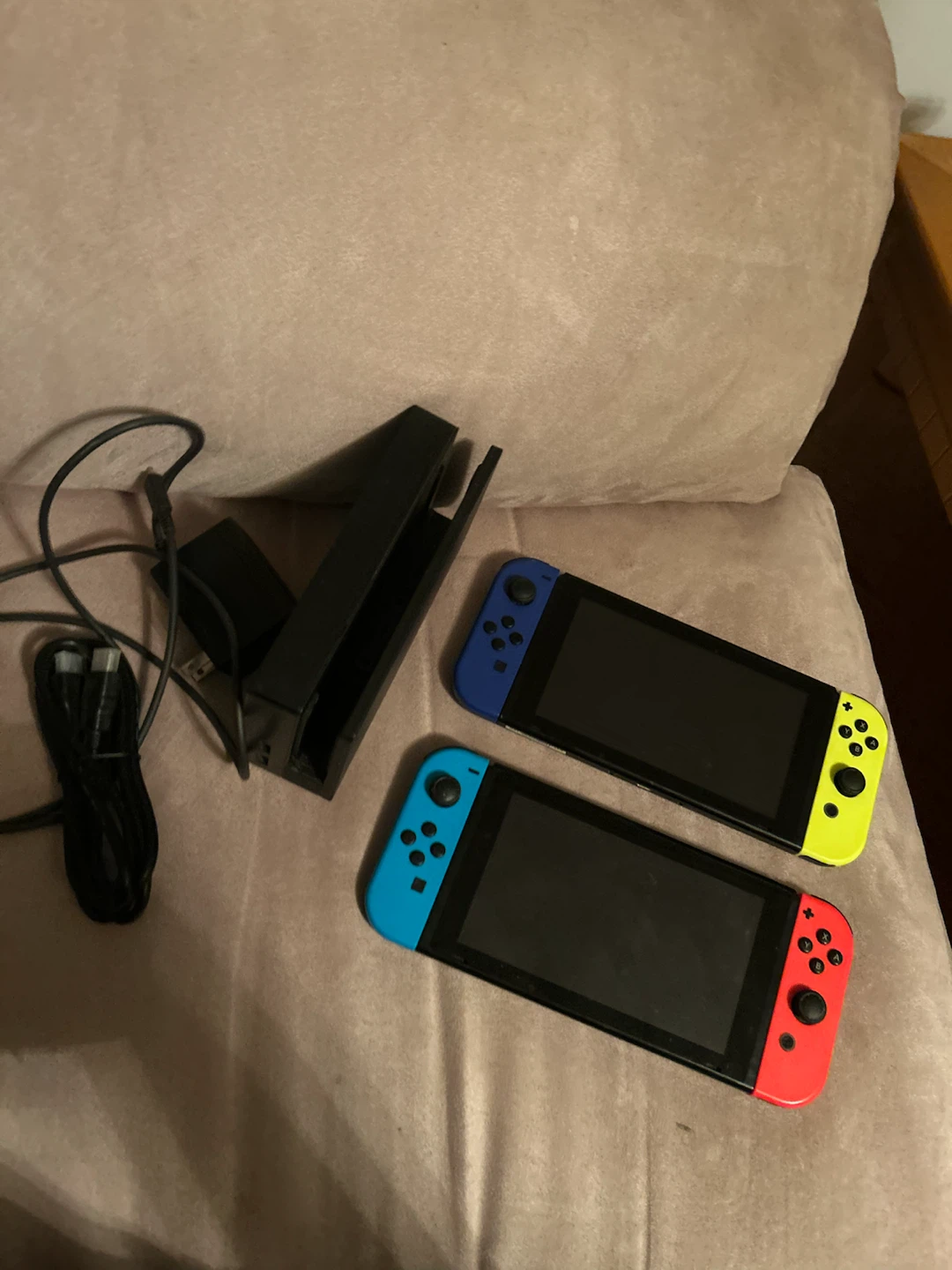 Two Nintendo Switch consoles with dock and cables - photo 3