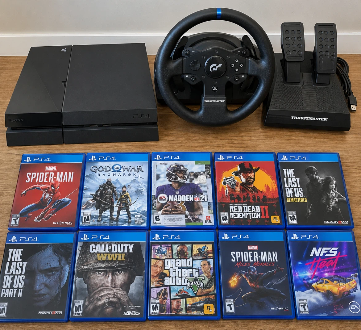 Sony PS4 Console with Thrustmaster Wheel and 10 Games
