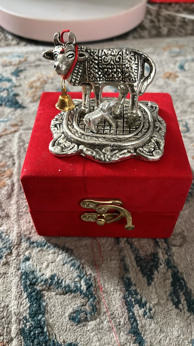Silver-toned cow and calf figurine