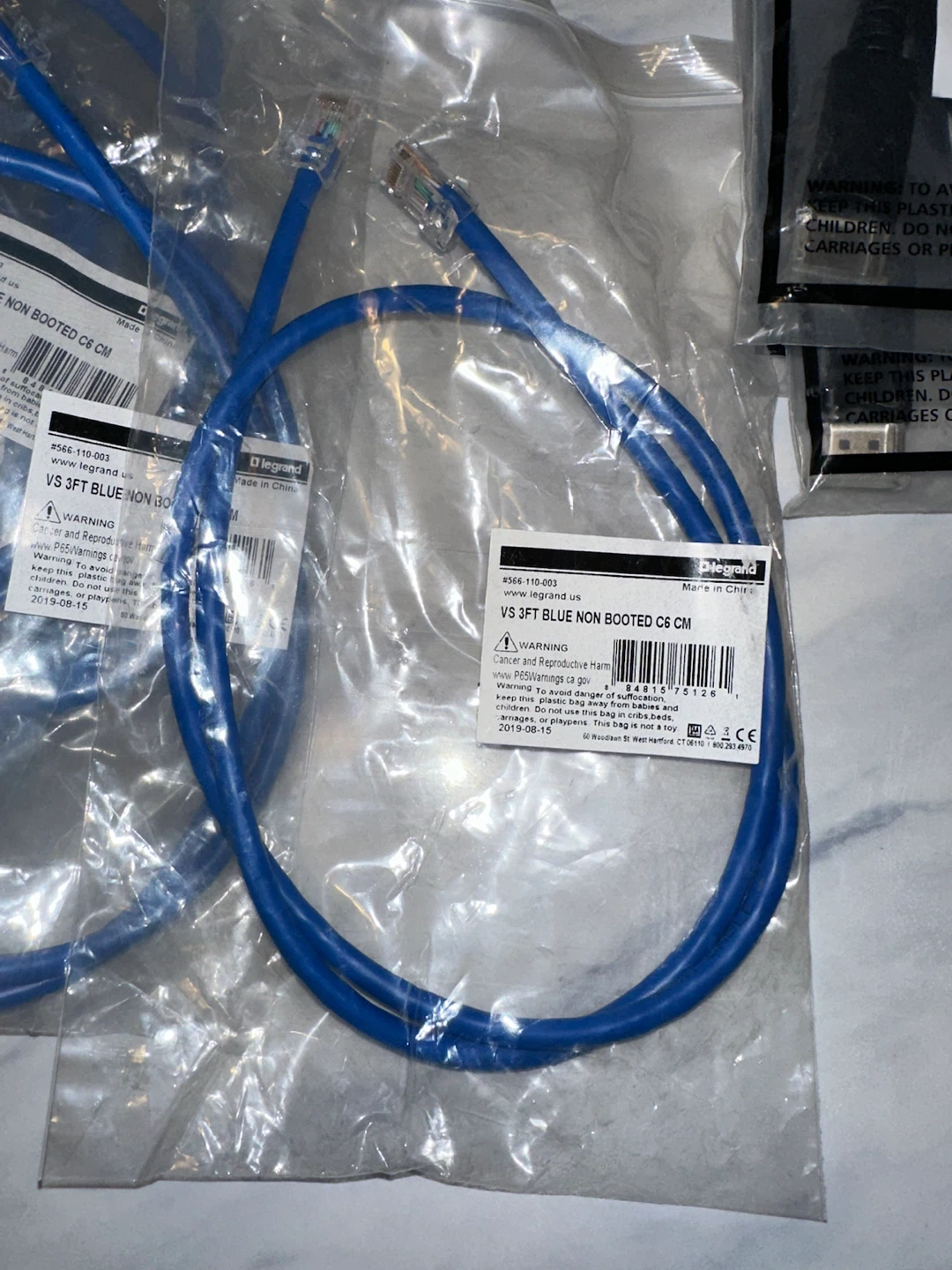 Assorted Cables: Legrand Ethernet and Tripp-Lite DisplayPort
