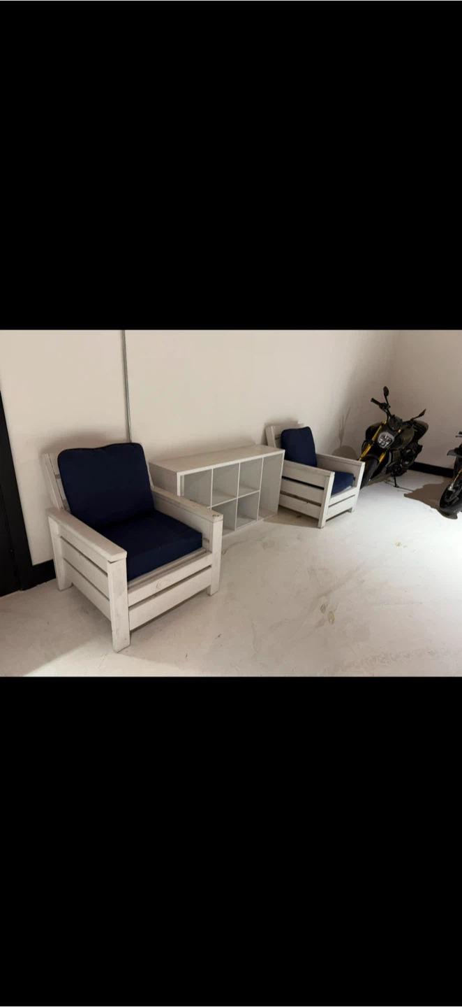 Two White Wood Chairs with Navy Cushions