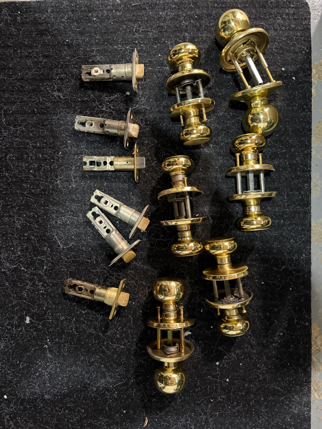Six brass handle sets, with hinges
