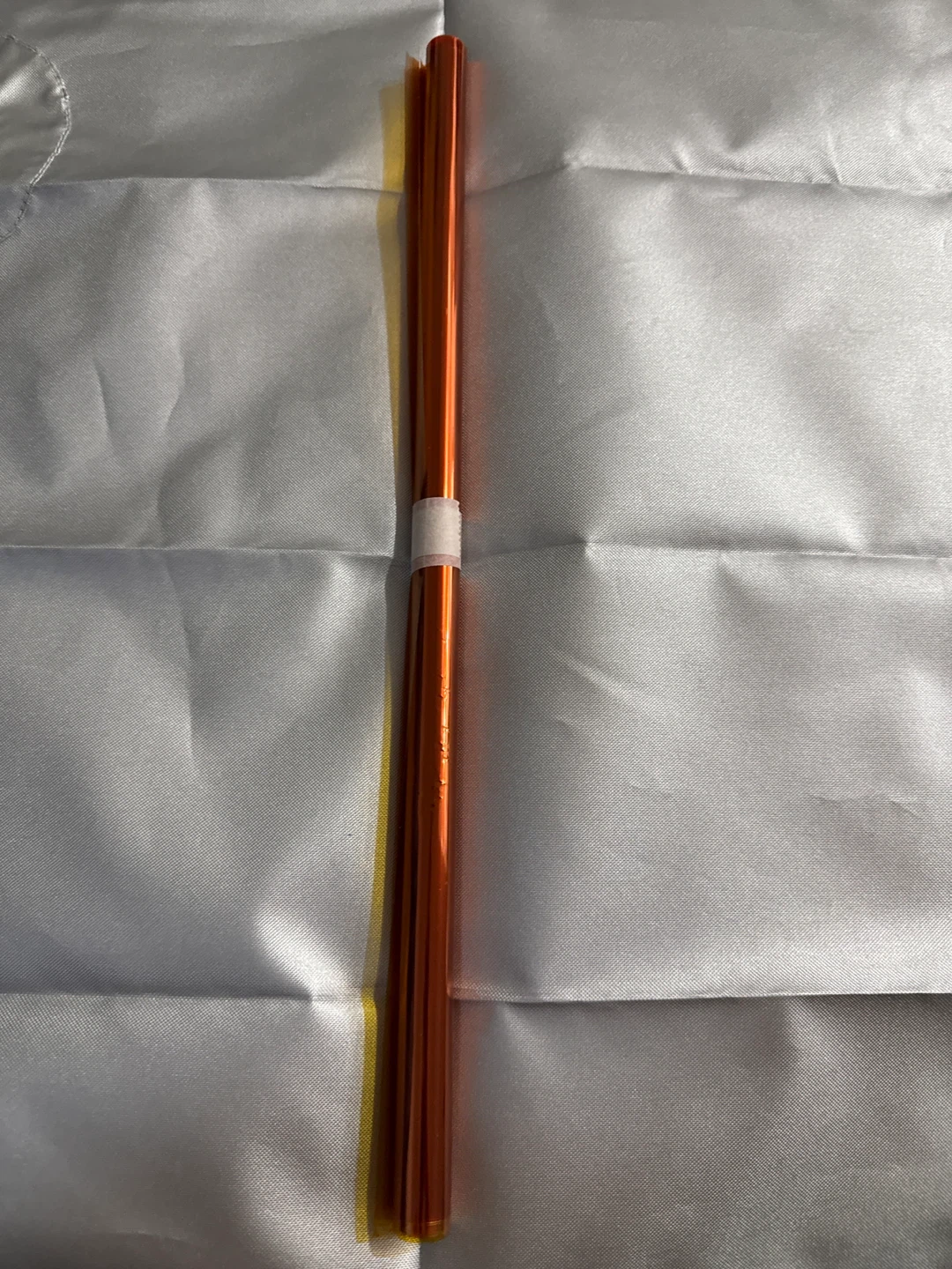 Orange metallic foil roll