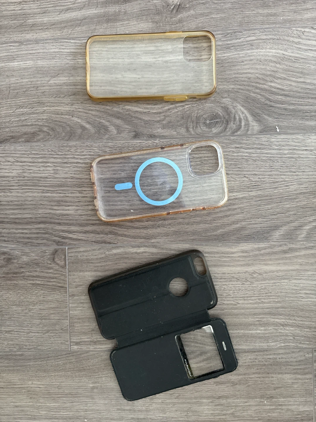 Three assorted phone cases