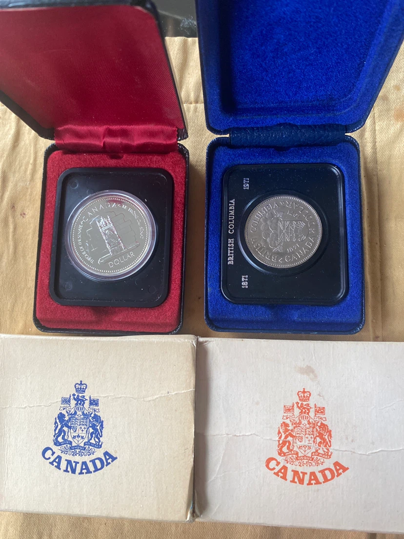 Two Vintage Canadian Commemorative Dollar Coins