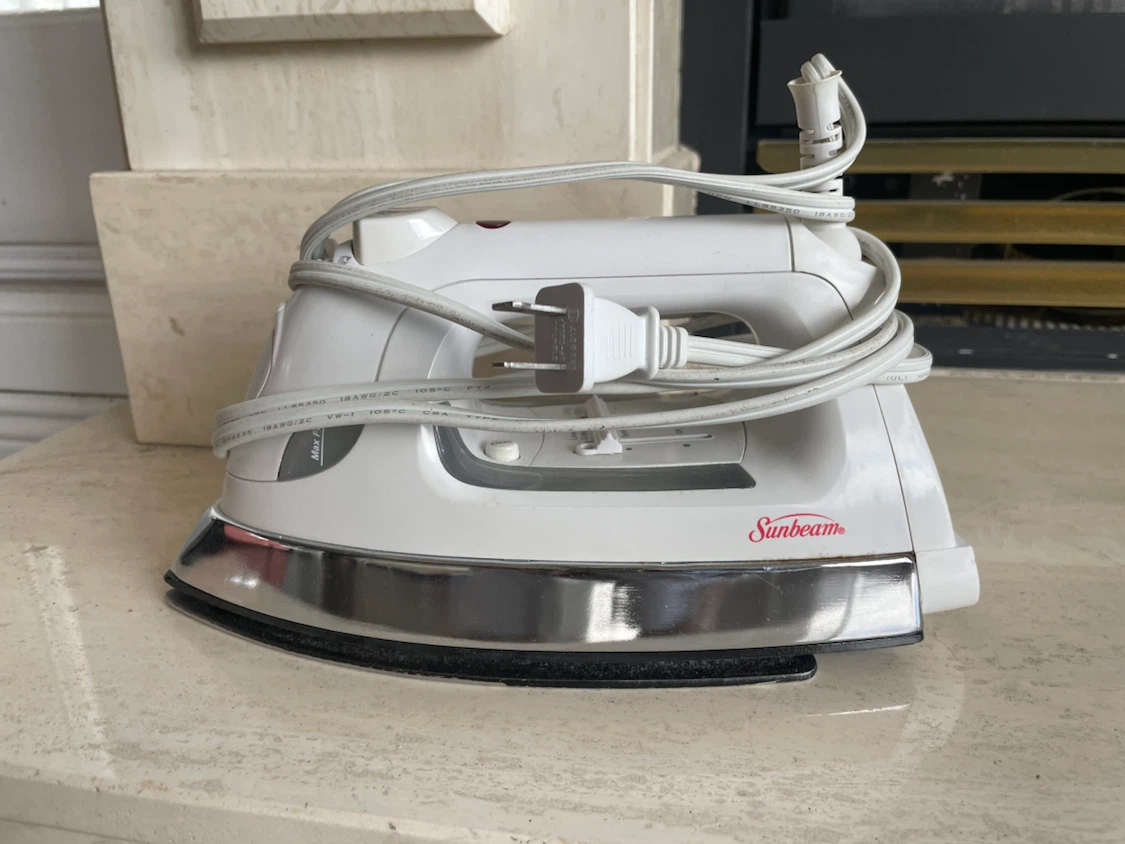 Sunbeam Steam Iron and the ironing board