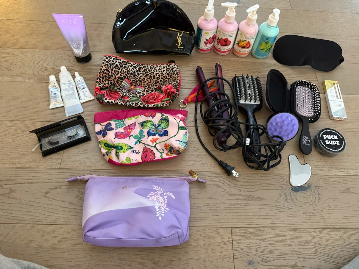 Hair straightener lotions cosmetic bags brush $25