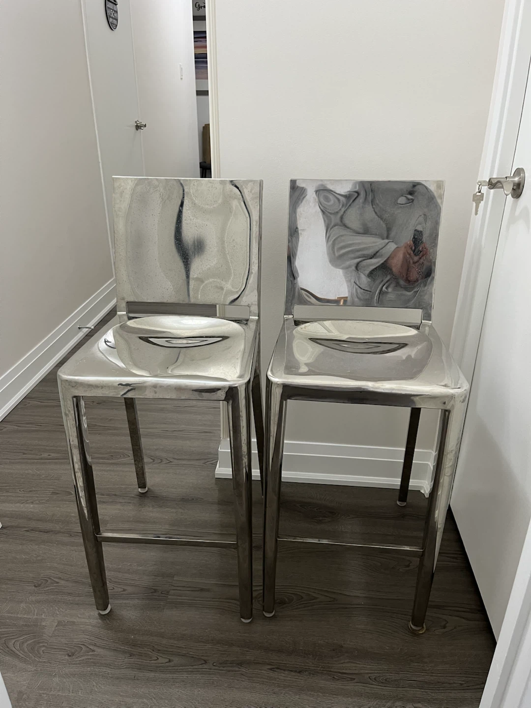 Two Polished Stainless Steel Bar Stools