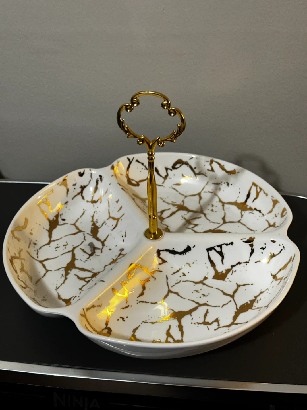 White and gold ceramic divided serving dish