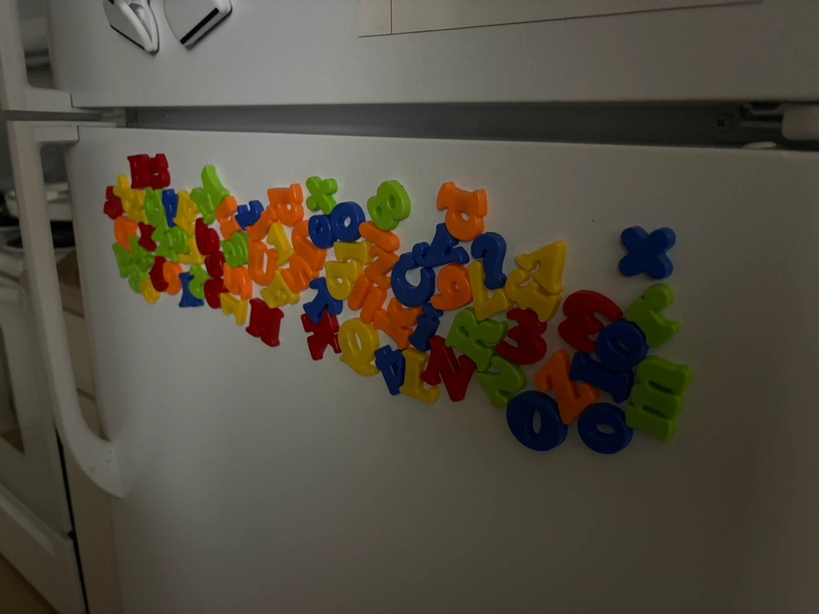 Set of colourful magnetic alphabet letters and numbers