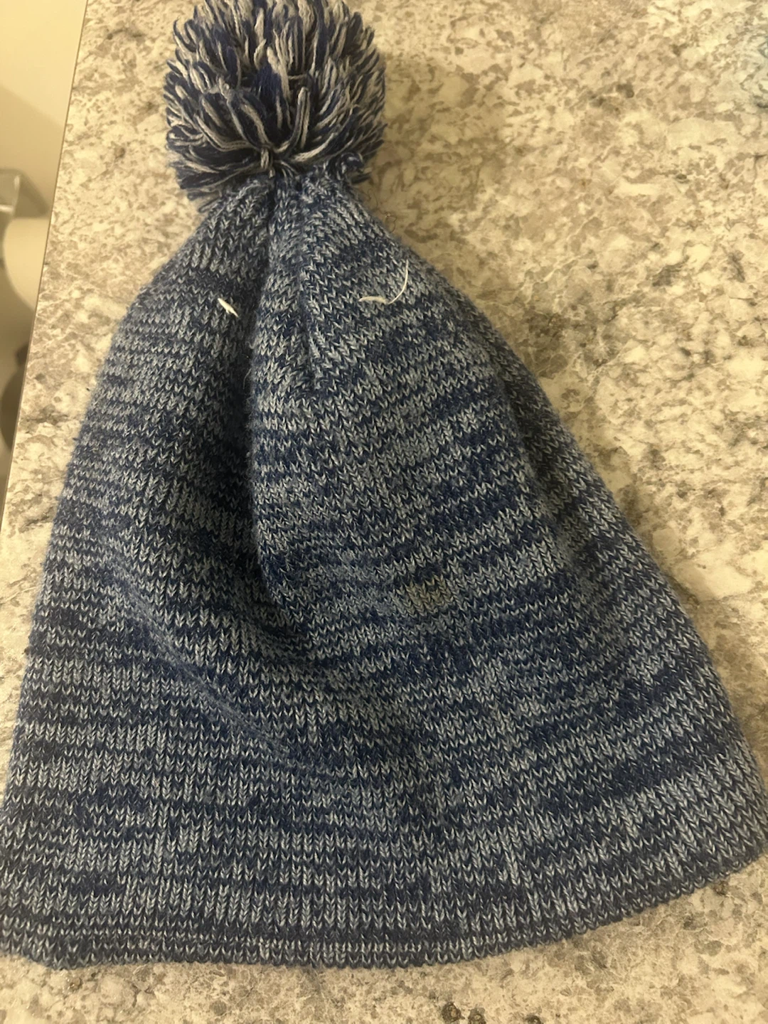 Blue and grey knit pom-pom beanie